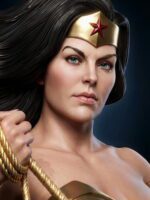 Close-up of a woman dressed as Wonder Woman, wearing a gold tiara with a red star and holding a golden lasso.