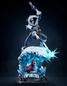 A detailed Captain Cold action figure perched on an icy arch, wielding a blue ice-emanating weapon with a blue glow against a dark background.